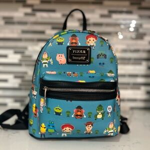 Disney Toy Story Loungefly mini book bag.